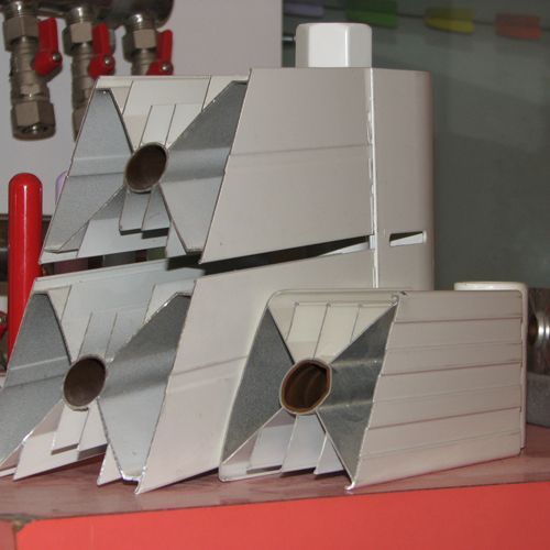 沙巴直播8080铜铝复合暖气片,切面,优质的纯铜内腔,铝制翘片超大散热面.